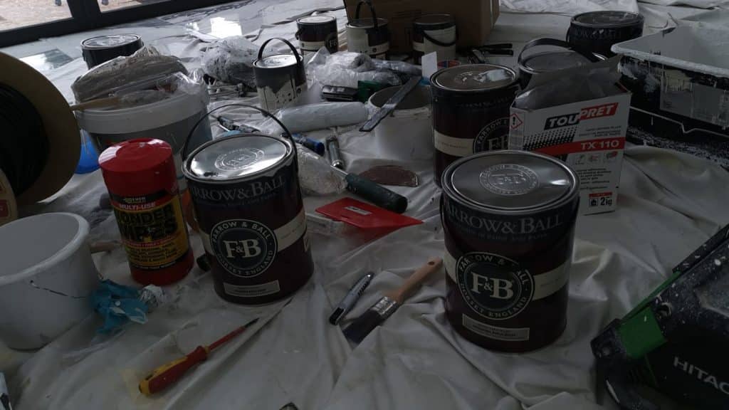 Farrow and Ball Modern and Estate Emulsion paint with other decorating tools