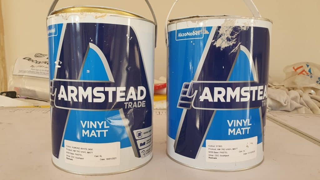 two tins of Armstead trade vinyl matt emulsion paint