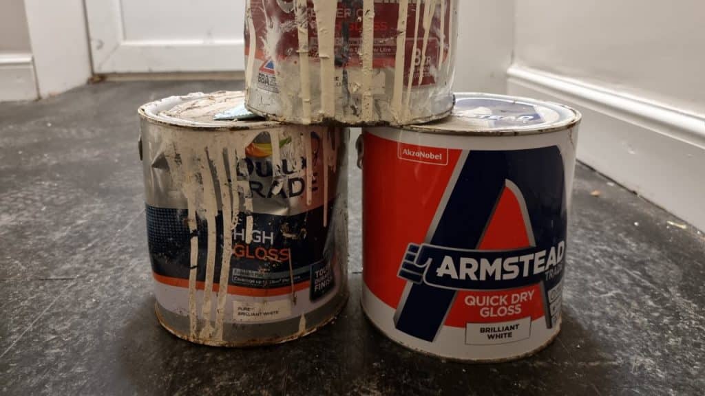 Three white gloss products that can be used to paint interior woodwork