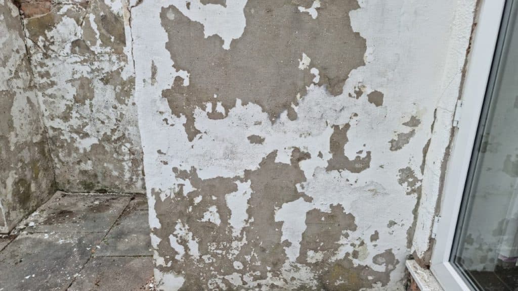 Preparing an exterior wall ready for painting