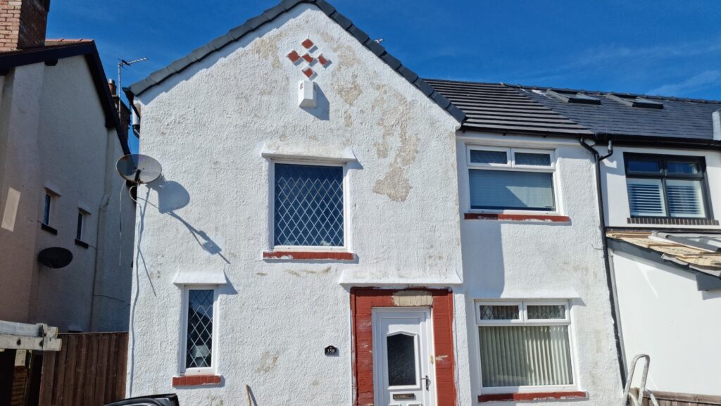 Water-based paint peeling on the outside of a house