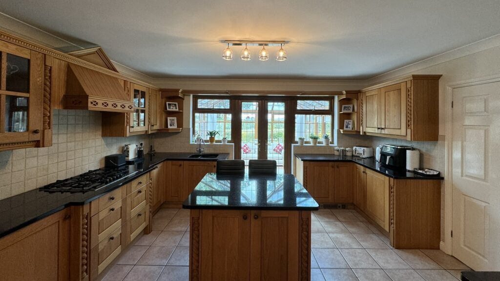 A well-lit, freshly painted kitchen
