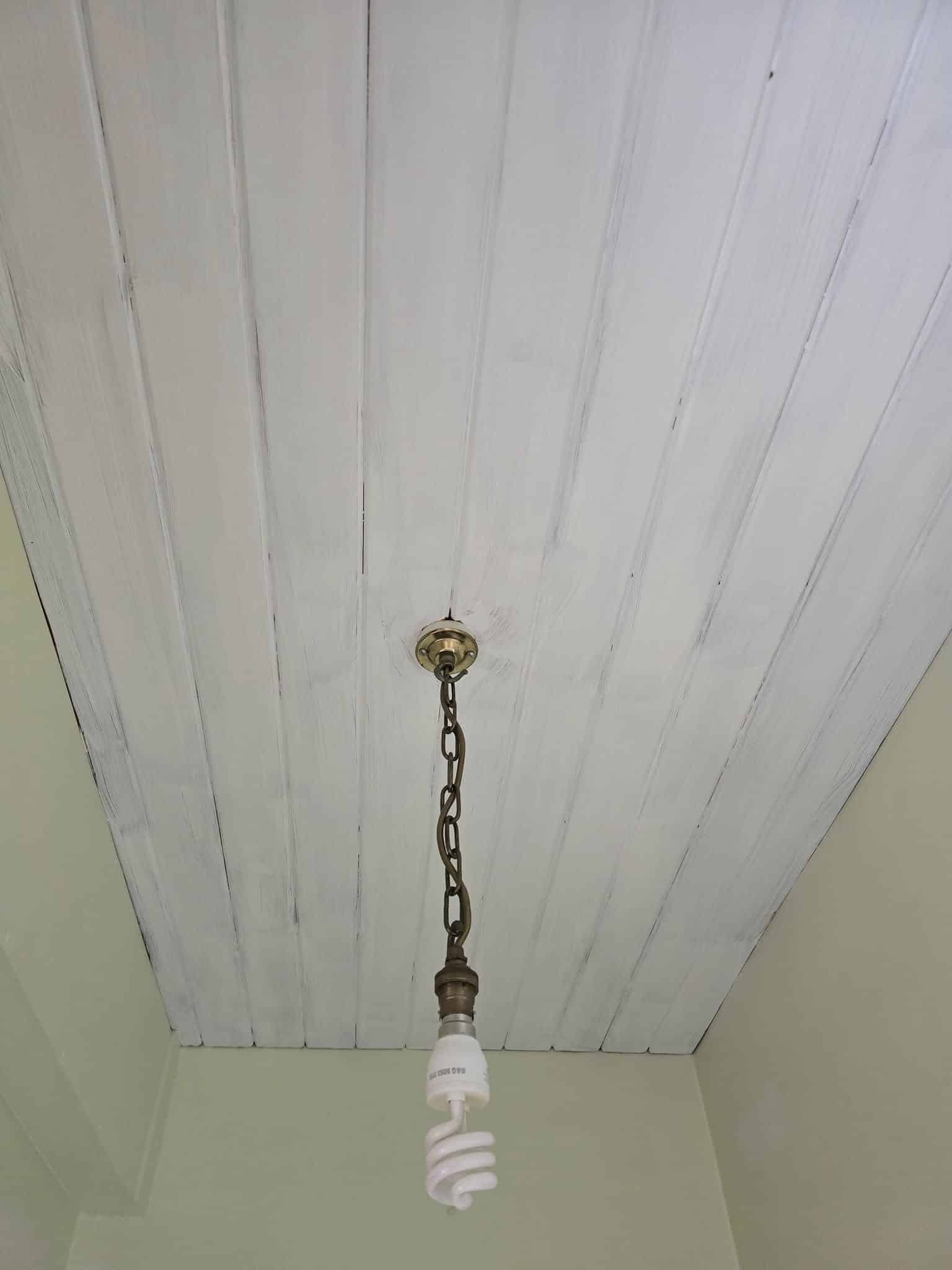 A varnished ceiling primed using Fiddes Full Stop H2O, ready to take topcoats.