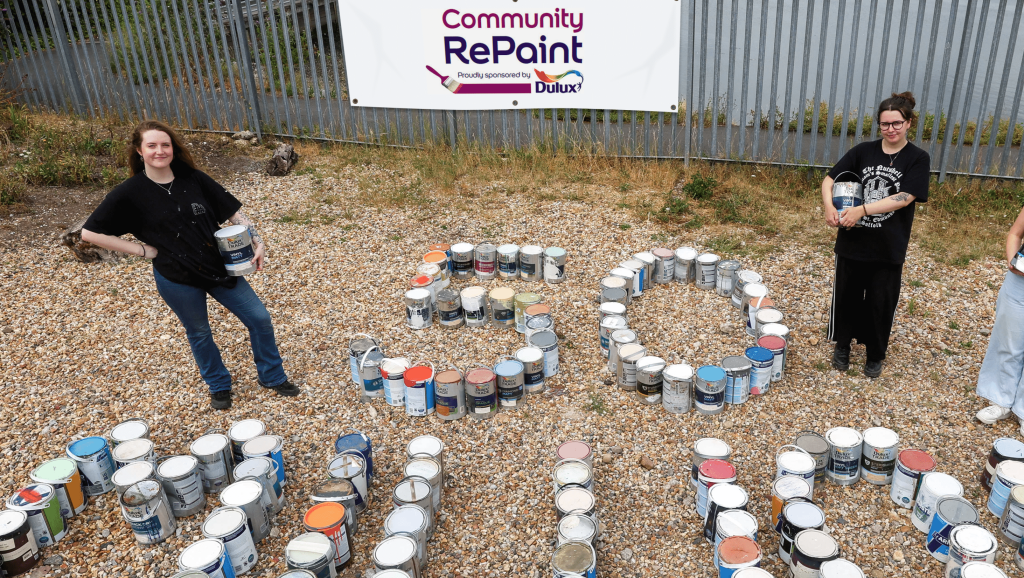 Community repaint and Dulux with empty paint cans