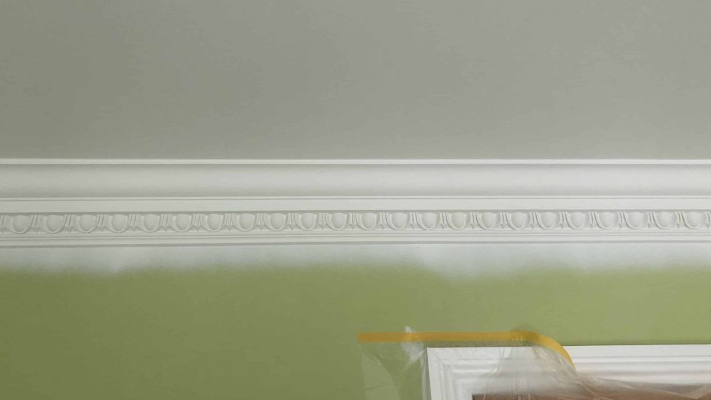 Cornice that has been sprayed using white emulsion