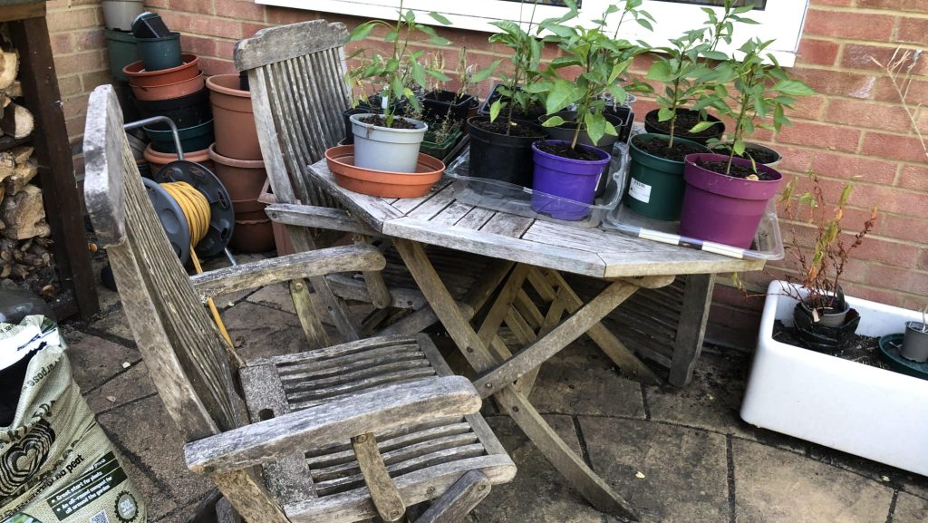 Wooden furniture that has started to weather outside