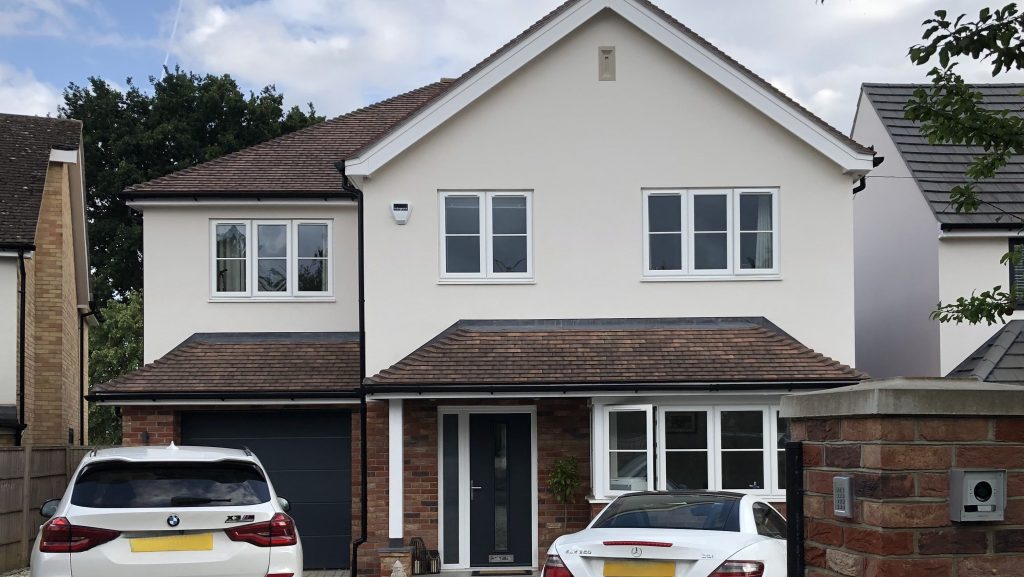 A rendered house freshly painted