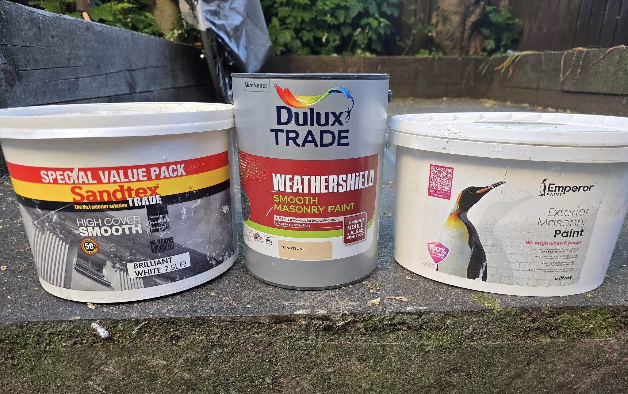 a selection of masonry paints