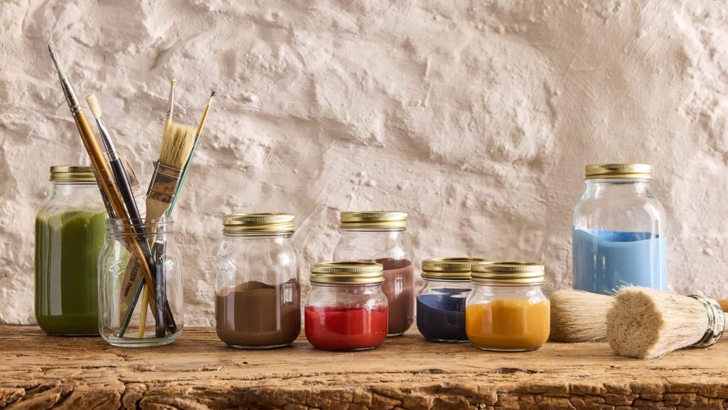 paint jars on shelf