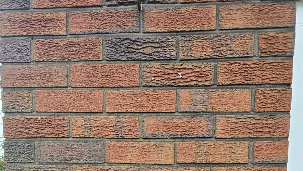 an exterior brick wall