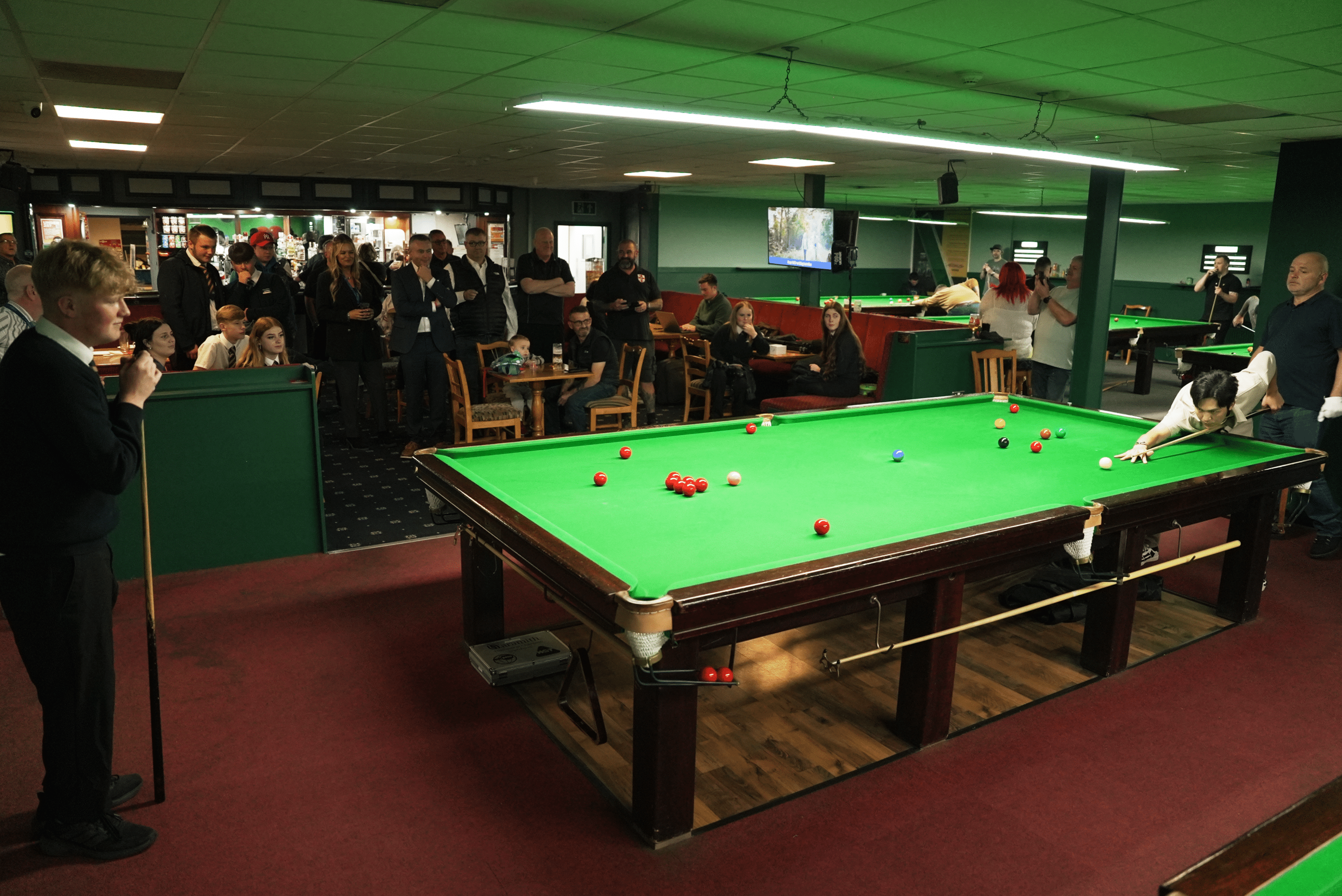 Kids playing snooker