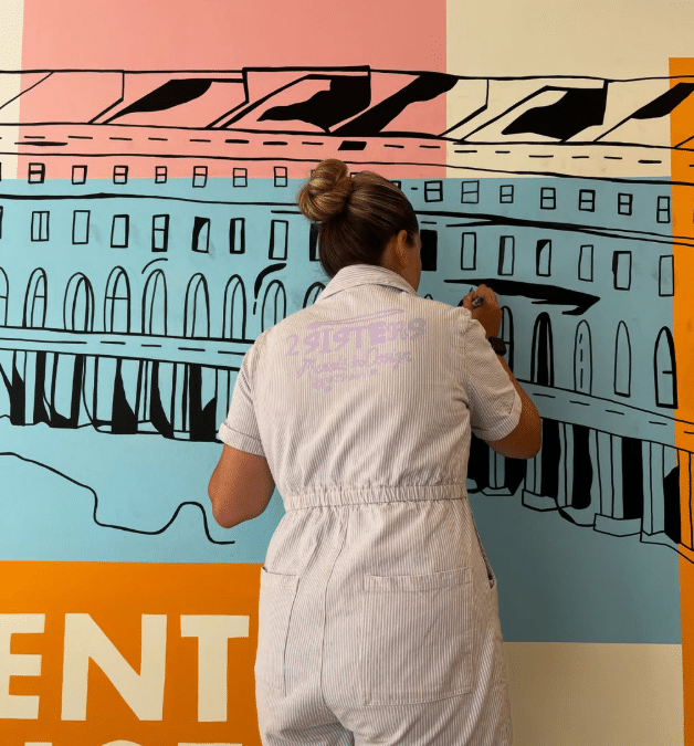 Bradite Packs a Punch in 2SistersUK Office Mural! 