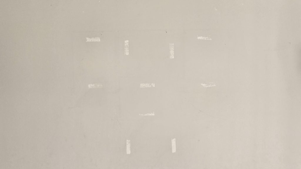 Sticker residue on a wall